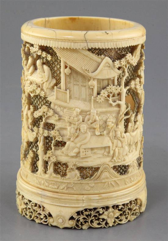 A Chinese ivory brush pot, early 19th century, height 15.8cm, old losses